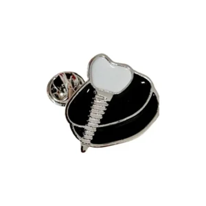Pin's en forme d'implant